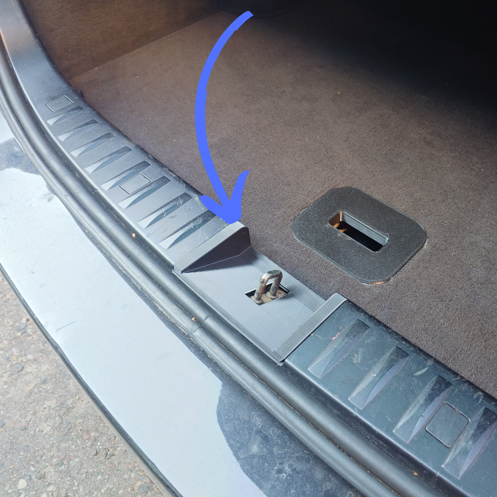 BMW E91 trunk latch cover