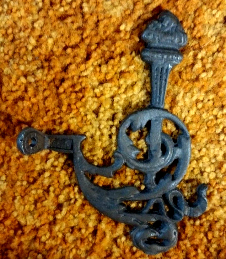 ANTIQUE CAST IRON (4) COAT TREE HOOKS WITH TORCHES ORNATE