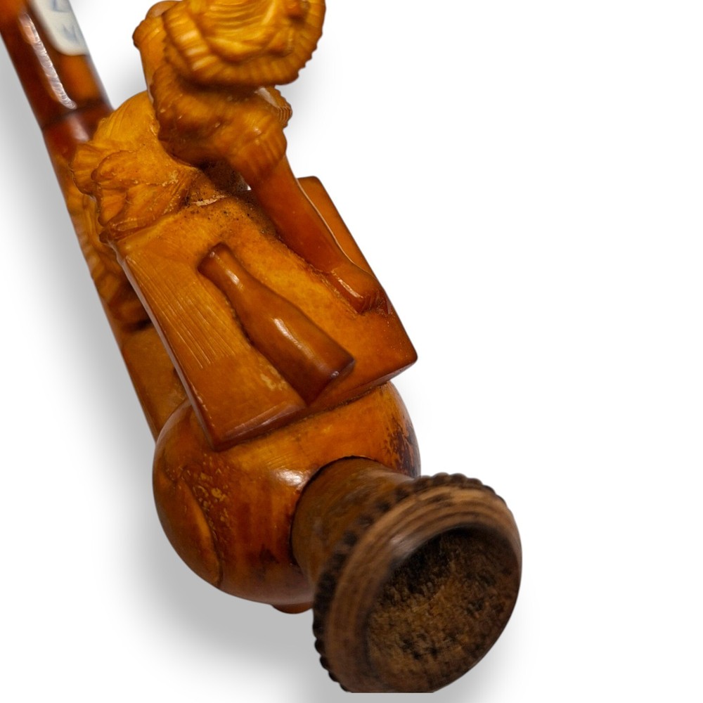 Antique pipe meerschaum lady with a table drinking