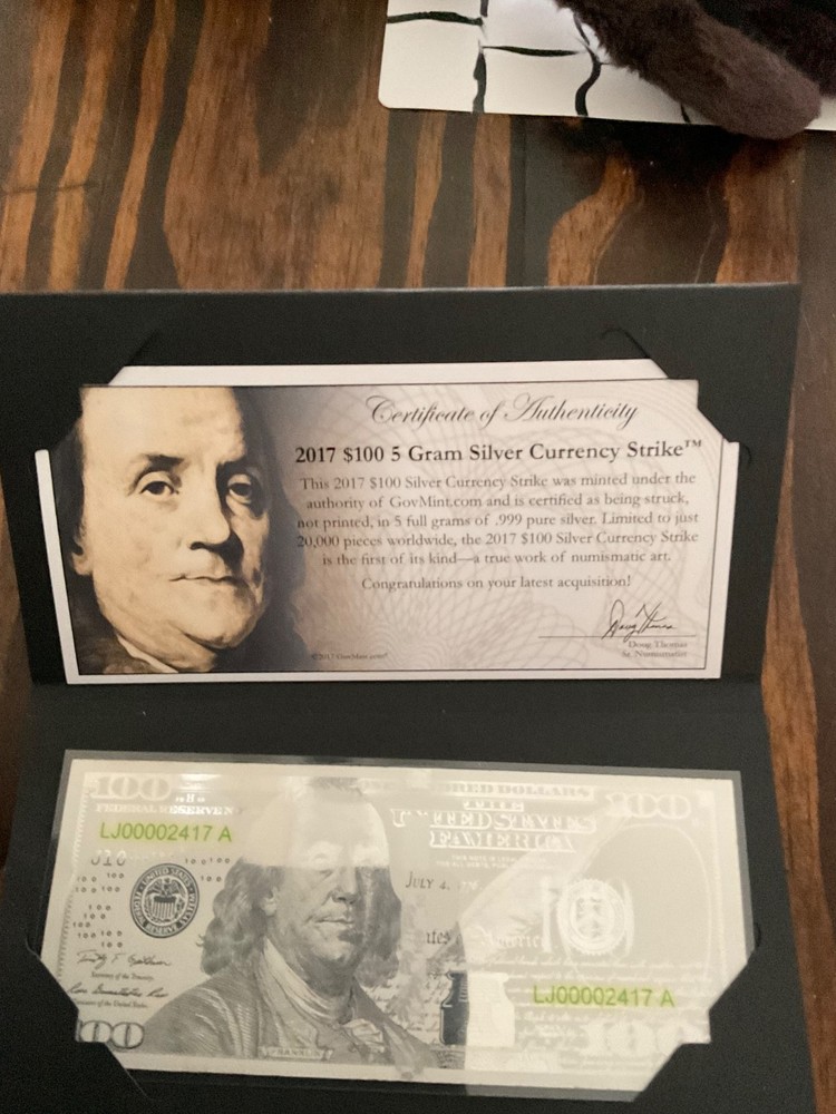 2017 $100.00 5 gram currency strike with pen.