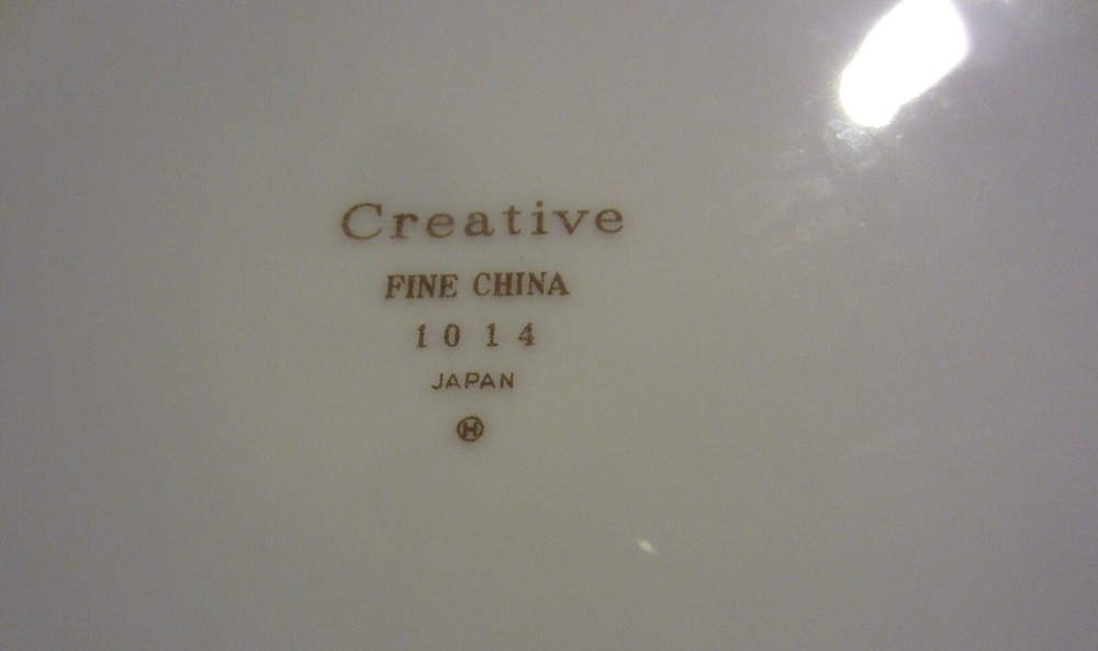 Vintage Creative Platinum Starburst China Dinnerware place settings for 4