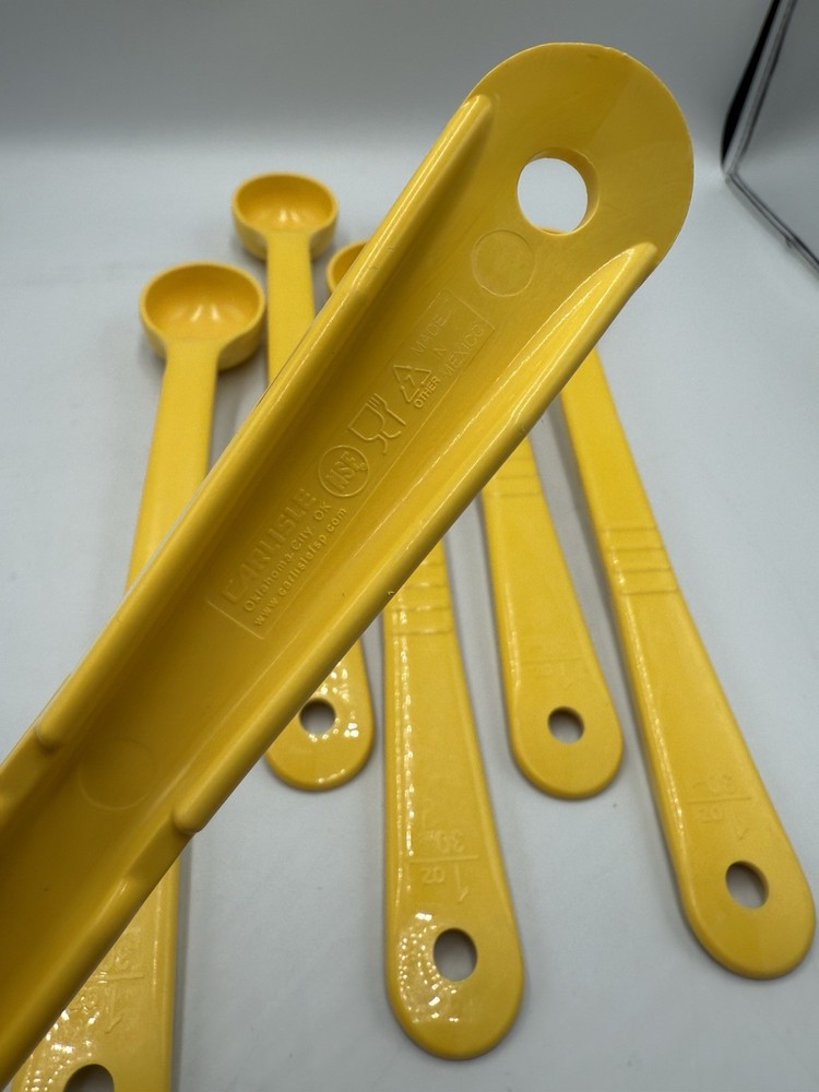 Carlisle 1 Oz. Yellow Long Handle Portion Spoon