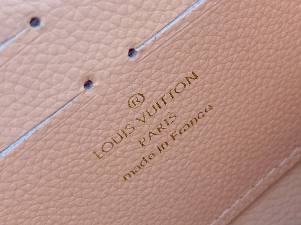 Louis Monogram Empreinte Zippy Wallet Pink
