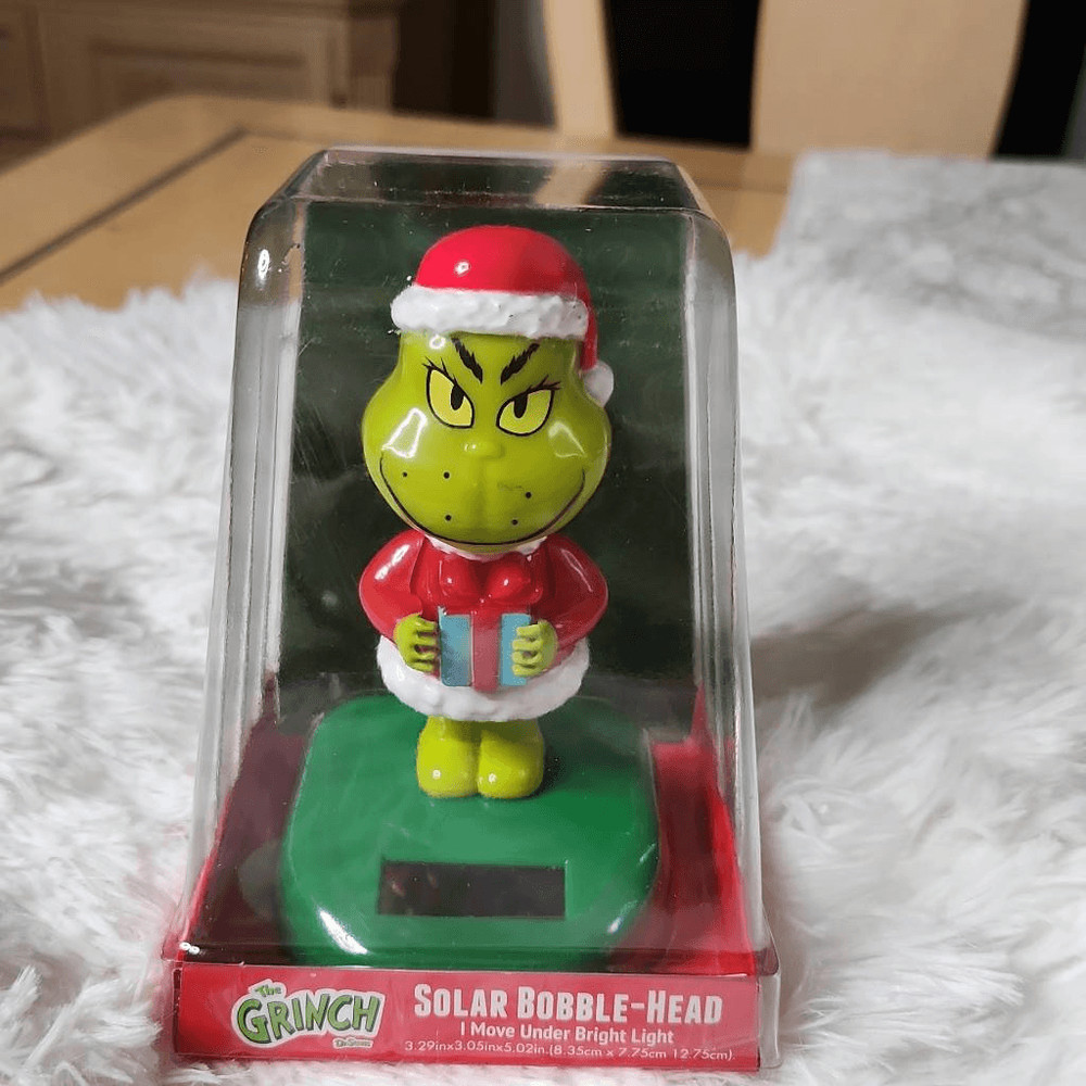 The Grinch solar Christmas bobblehead