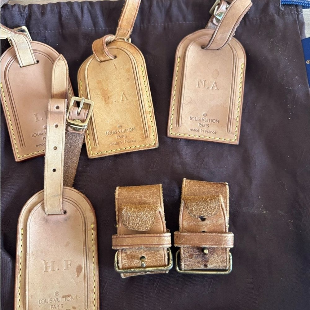 Authentic Louis Vuitton id tags lot with dust bag