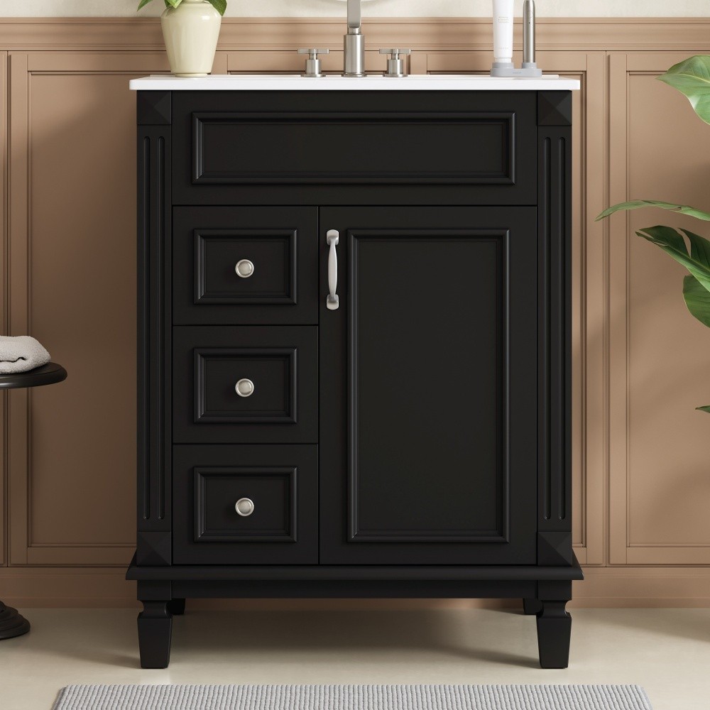 Bathroom vanity W ceramic sink Features two drawers Includes adjustable shelves