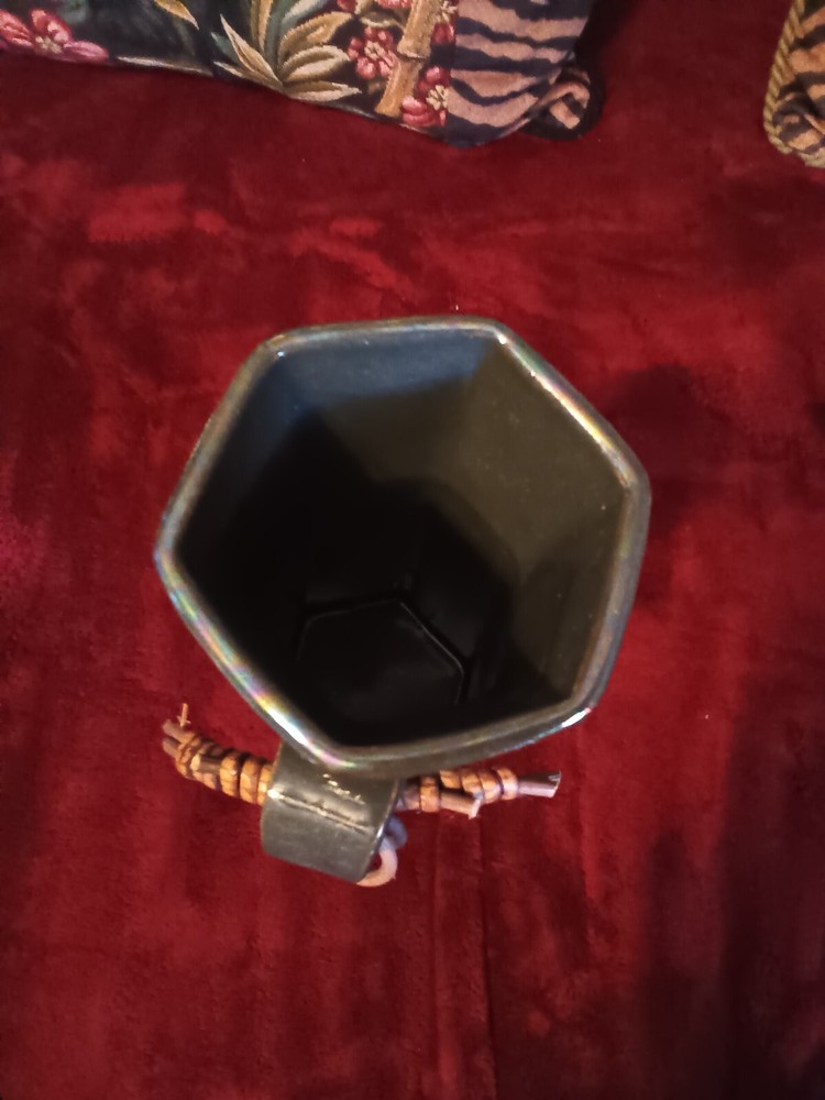 Ceramic blue iridescent sheen pitcher with 3 giblets ,pitcher is signed.READ.