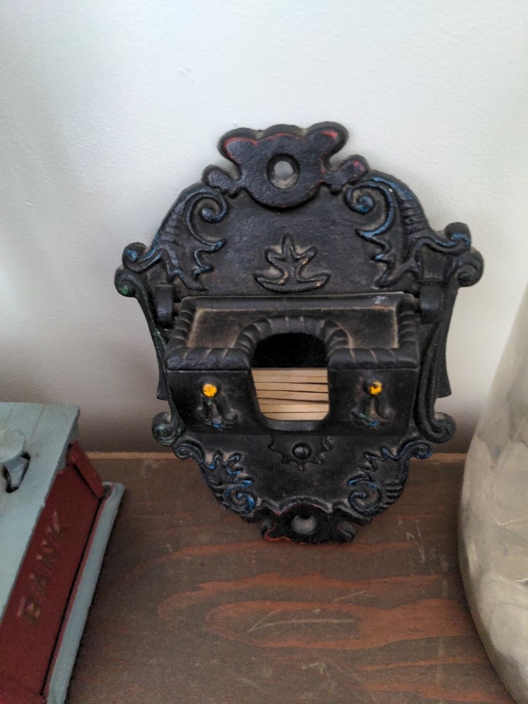 vintage wilton cast iron match holder