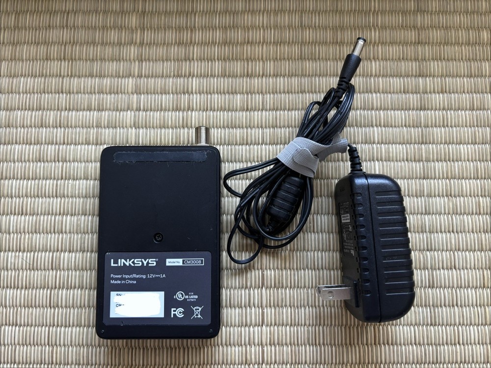 linksys cm3008 Modem + charger