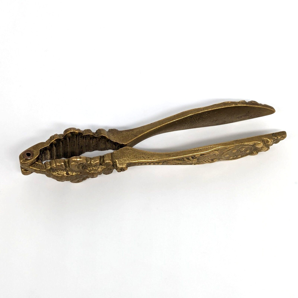 Brass Nutcracker Fleur de Lys Embossed Ornate Cast Floral Hollywood Regency