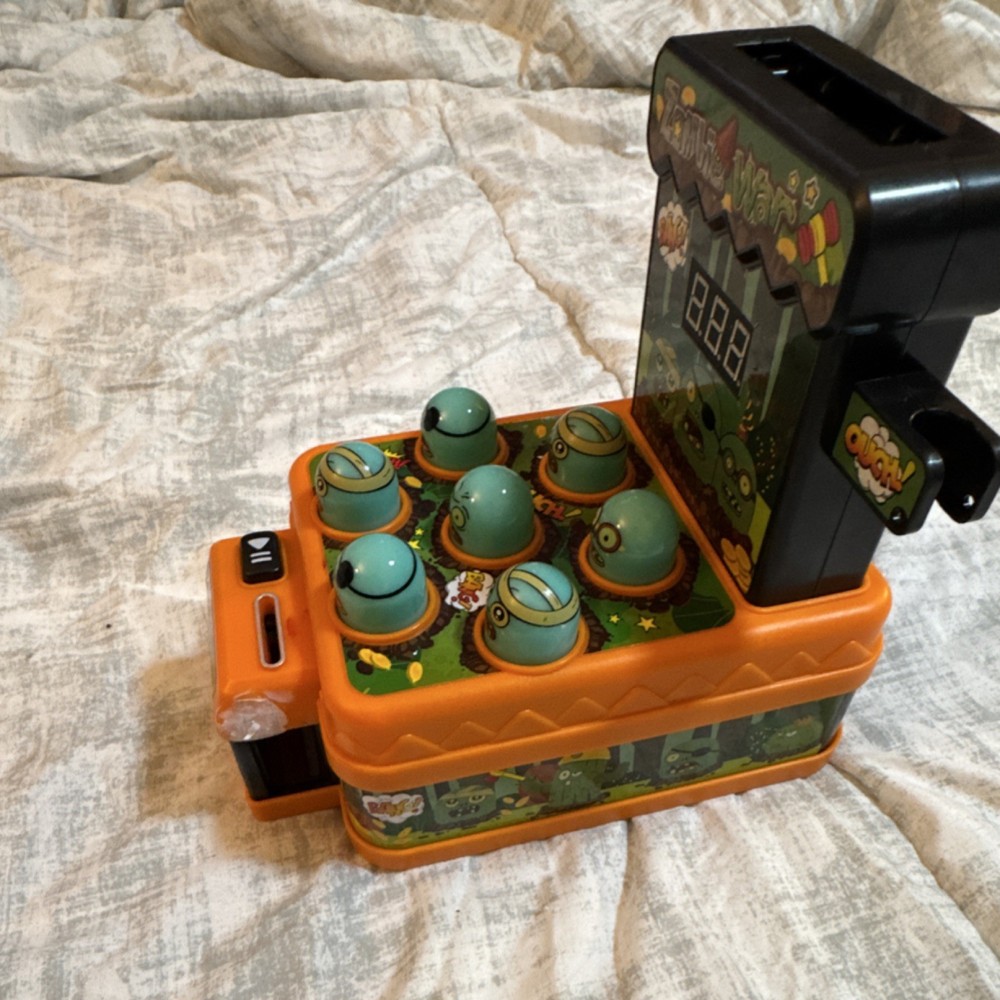 Zombie War Electronic Handheld Whack-a-Mole Game with Digital Score Display