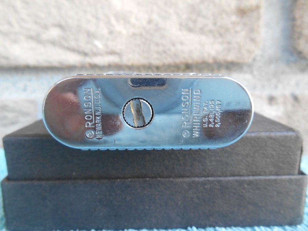 Vintage Ronson WHIRLWIND CHROME CIGARETTE LIGHTER. ETCHED 14TH CENTURY SHIELDS