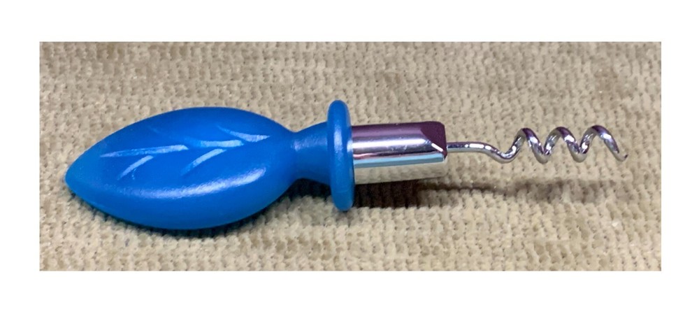 USUAL CORKSCREW REMOVER PULLER TOP MADE OF VERY HARD MATERIAL, NOT SURE?