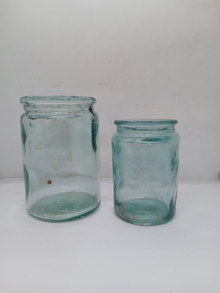 2 Old Different Size Glass Jars