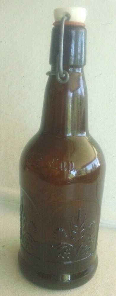 One E-Z Cap Amber 16 Ounce Bottle with Embossed Pattern on Side