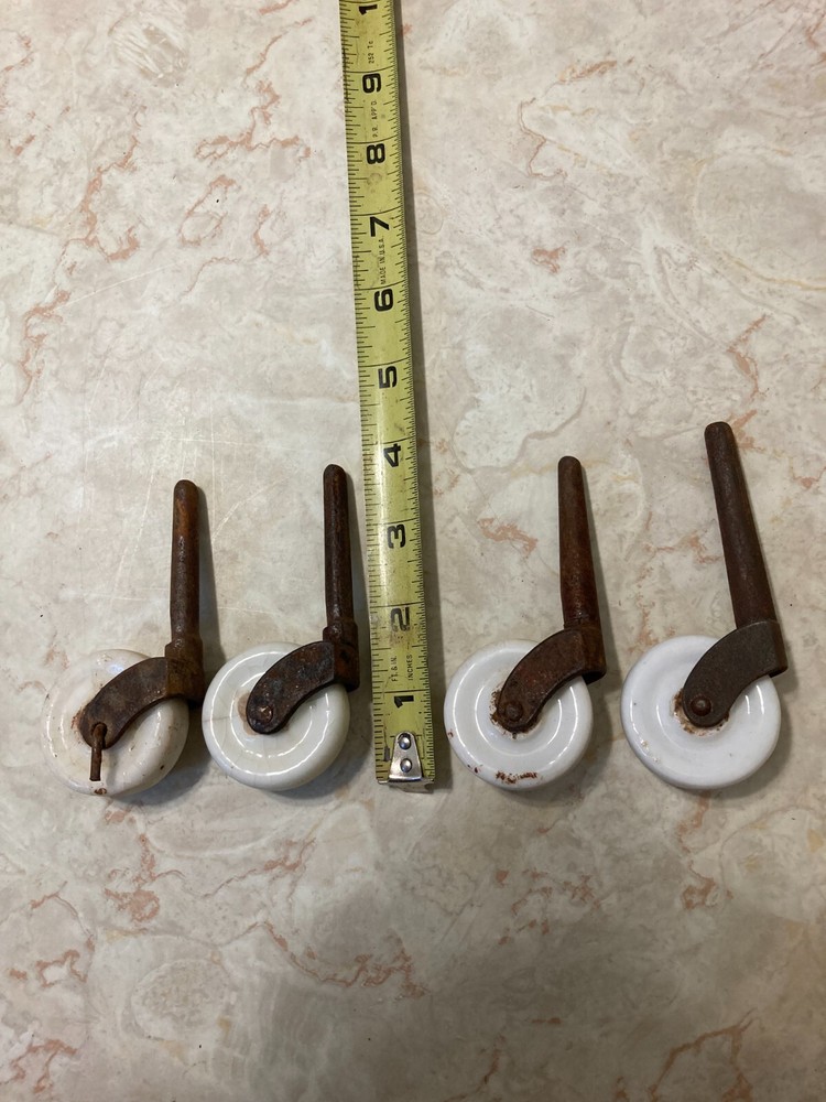 4  VINTAGE Salvaged CERAMIC WHEEL CASTERS WHEELS