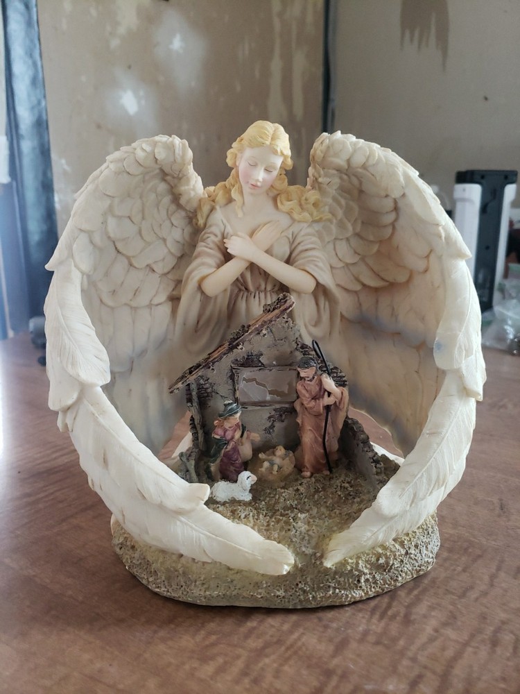 Sculptured Angel Night Light With Nativity Scene