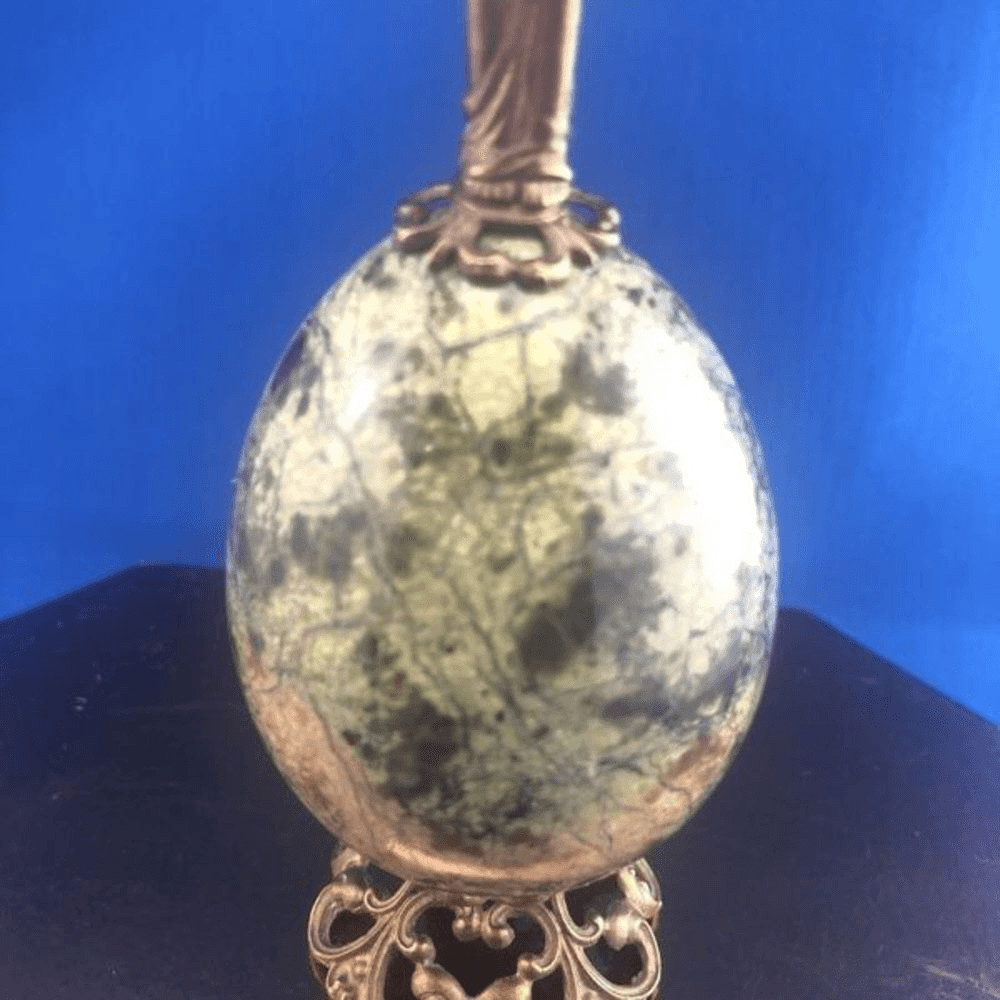 Green Marvel Egg With Brass Angel On Top