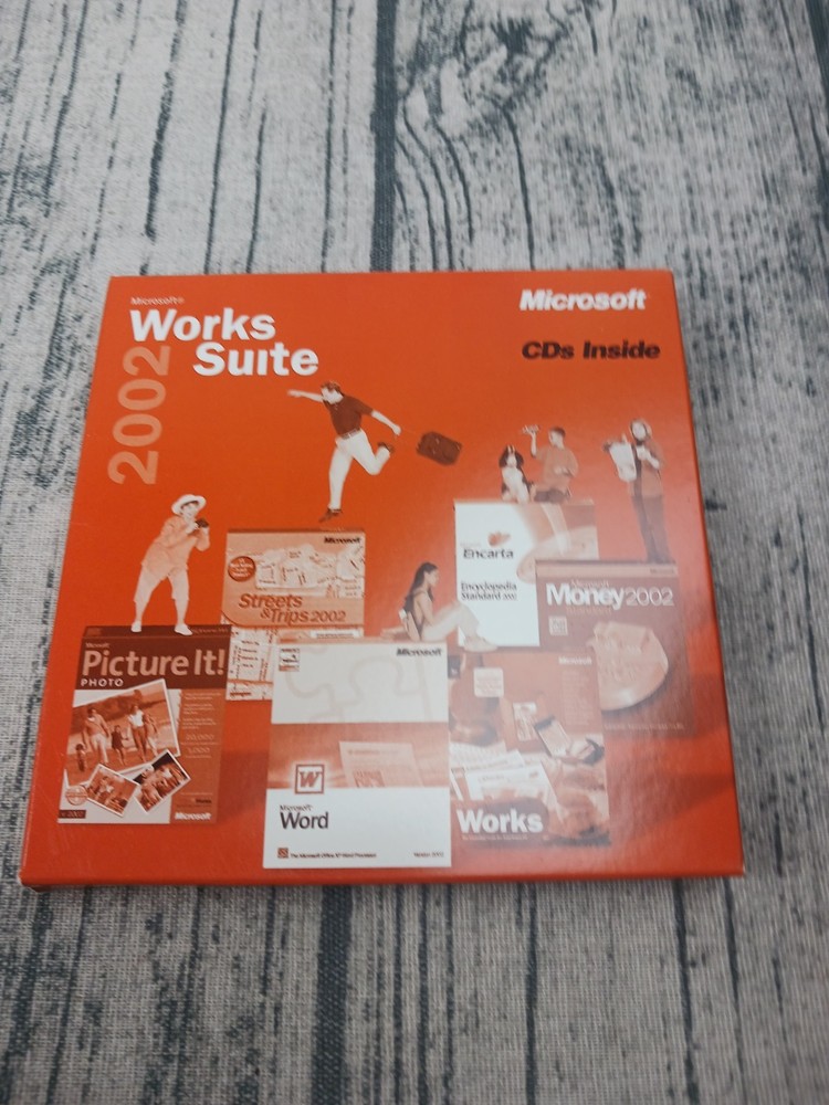 Microsoft Works Suite (2002) Pre-Owned, Good Condition