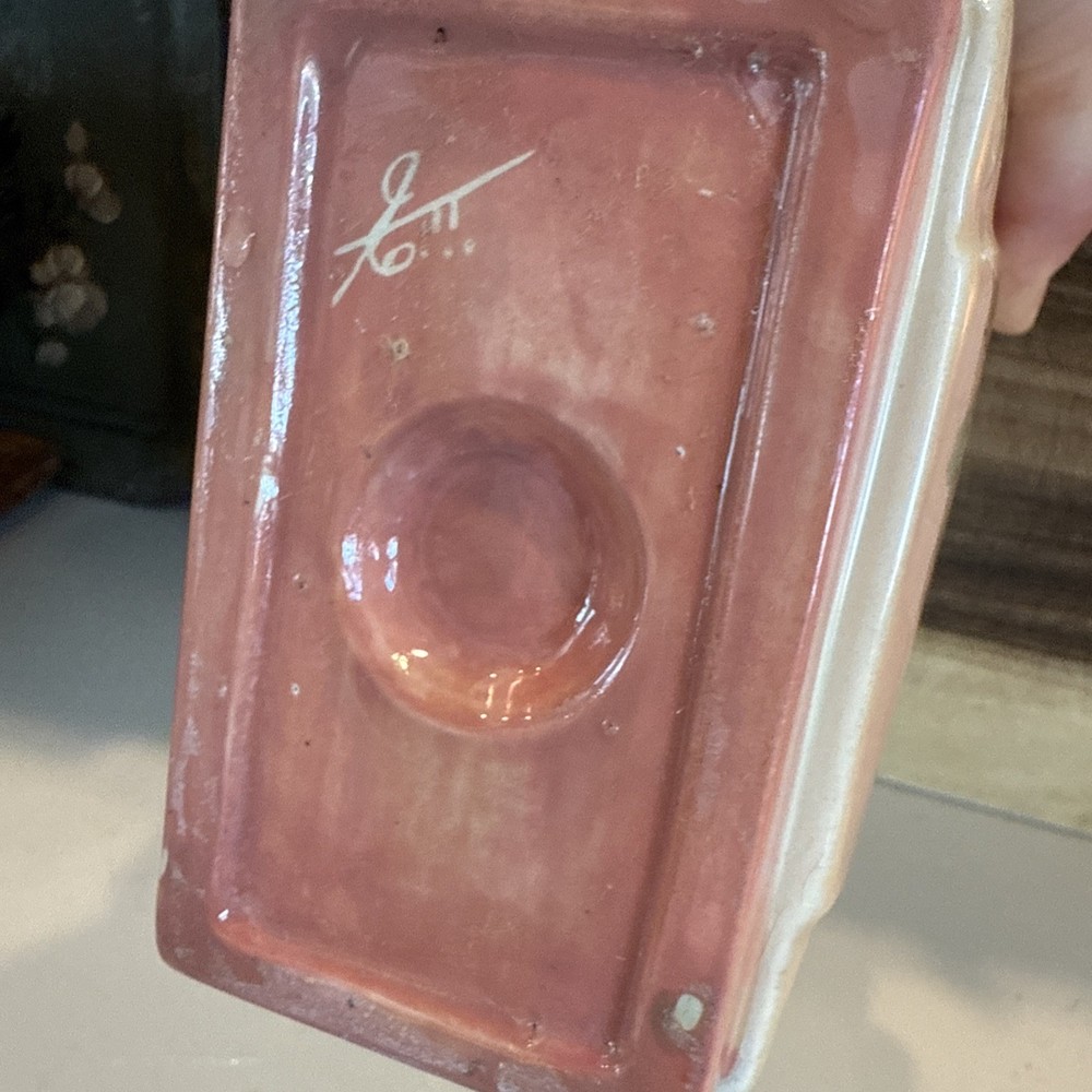 vintage ceramic piece, likely a planter, vase