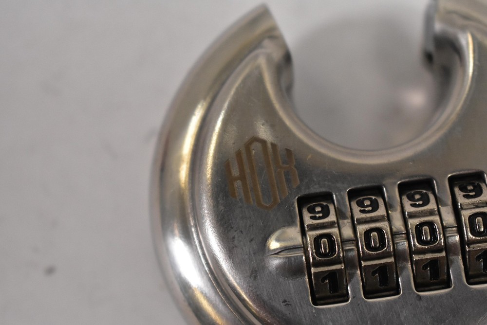 HOH Combination Padlock Medium Silver Steel Round Disc 4-Dial Lock Shrouded