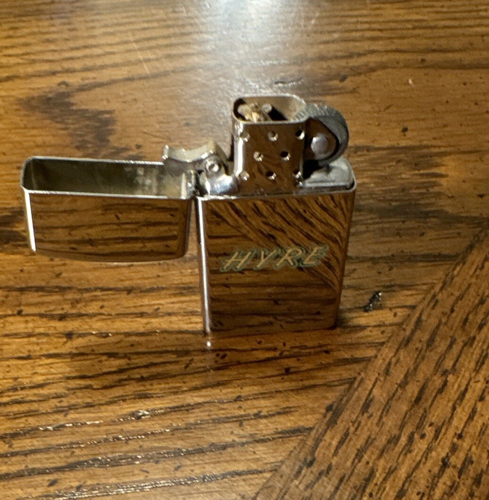 1970 Zippo Slim Lighter “HE” “HYRE”