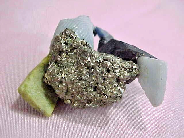 Carved Stone Birds Pyrite Base