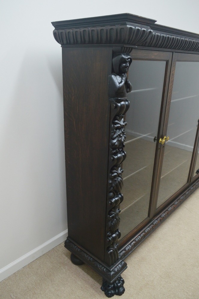 R. J. HORNER OAK PRAYING MONKS 3 DOOR BOOKCASE