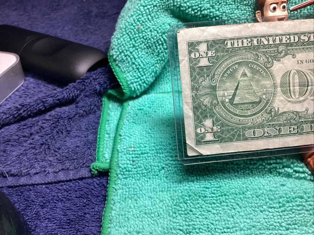 1957 A SILVER CERTIFICATE EF in RIDIG HOLDER🦅