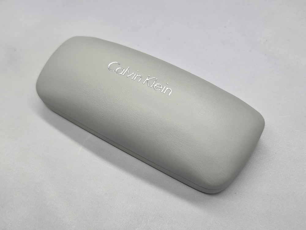 Calvin Klein Light Gray Clamshell Eyeglass Case