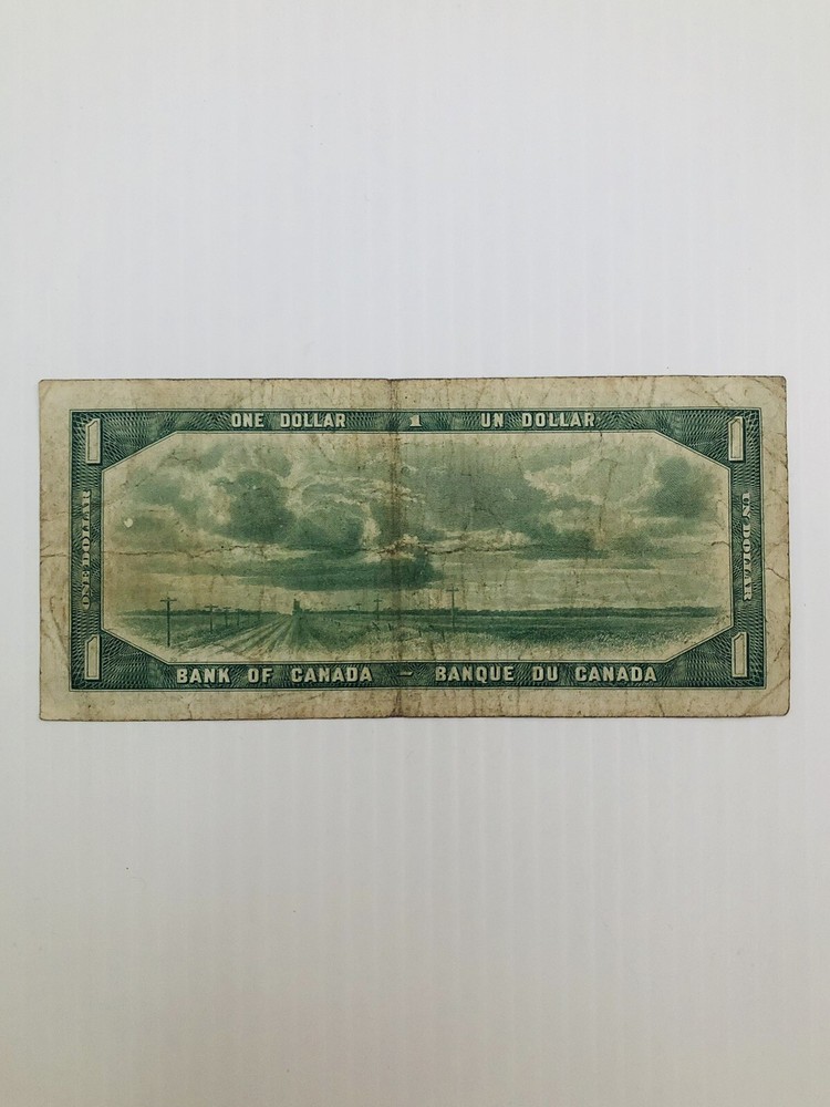 Canada 1 Dollar 1954 Devil’s Face Variety Rare
