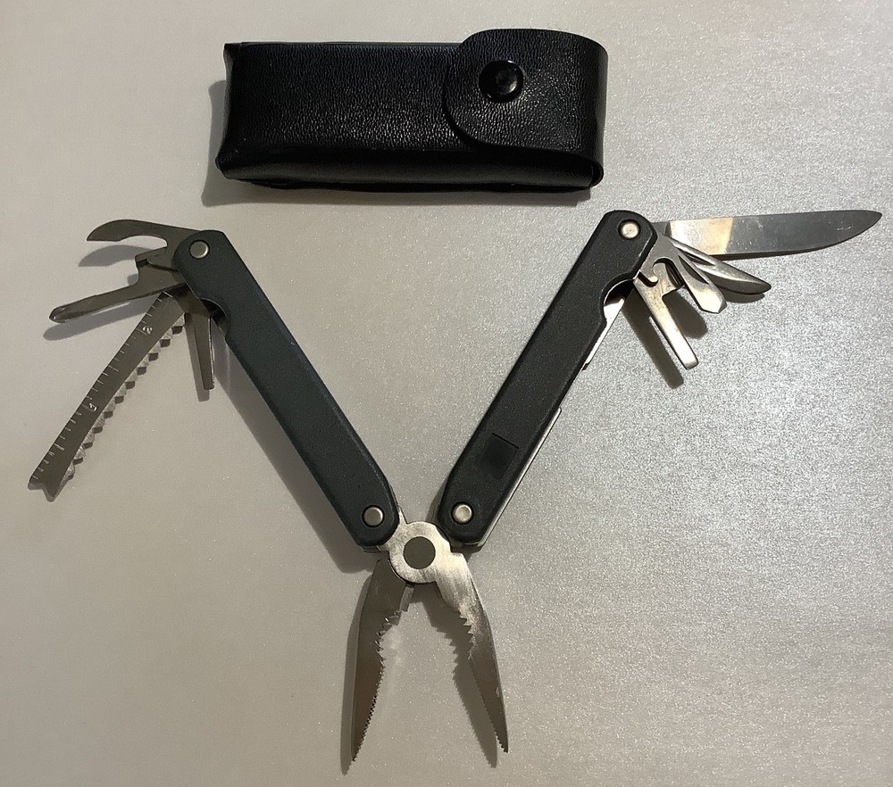 SALE $8 Multitool 8 Function Black Handle Not Branded In Case