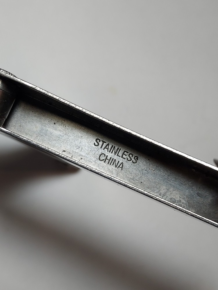 Stainless Steel Multi Tool advertising Rayovac