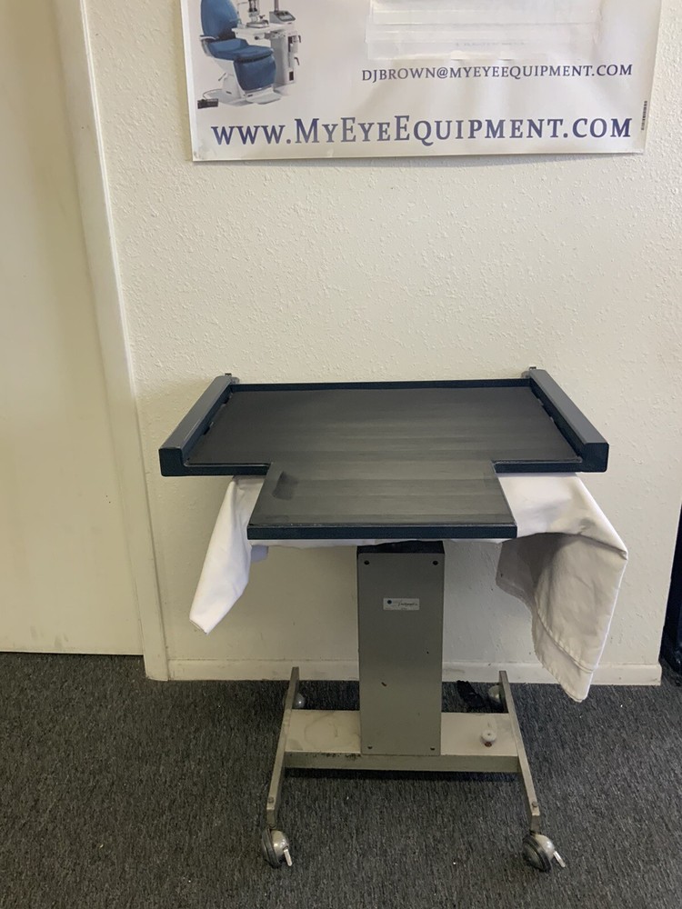 Ophthalmic Chair mover. TOPCON
