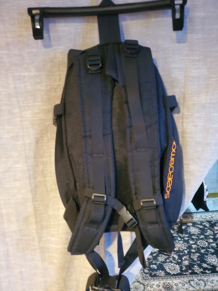 Ride Snowboards: Orange/Black Snowboarding heli-pack backpack