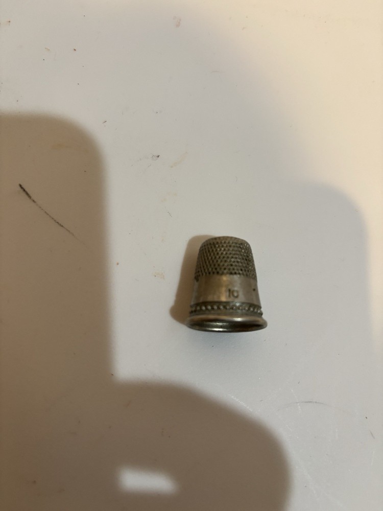 Five thimbles. Sizes 8, 9, 9,10,11