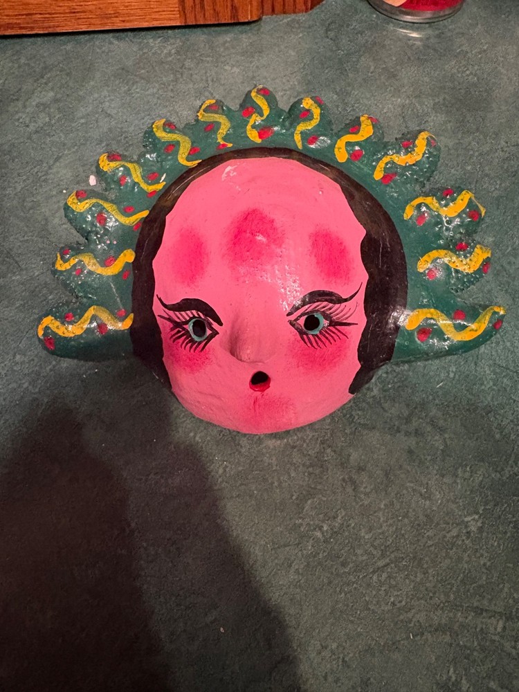 2 primitive string holders. Looks to be handmade.