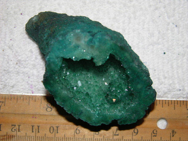 Geode cut & polished half with colored crystal center 3 inch E83