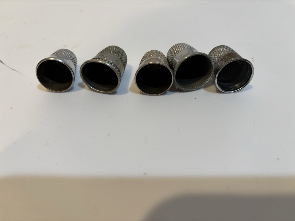 Five thimbles. Sizes 8, 9, 9,10,11