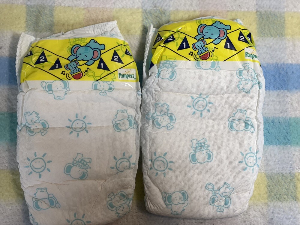 Vintage Tape Tab diapers Medium/Large 4 Count
