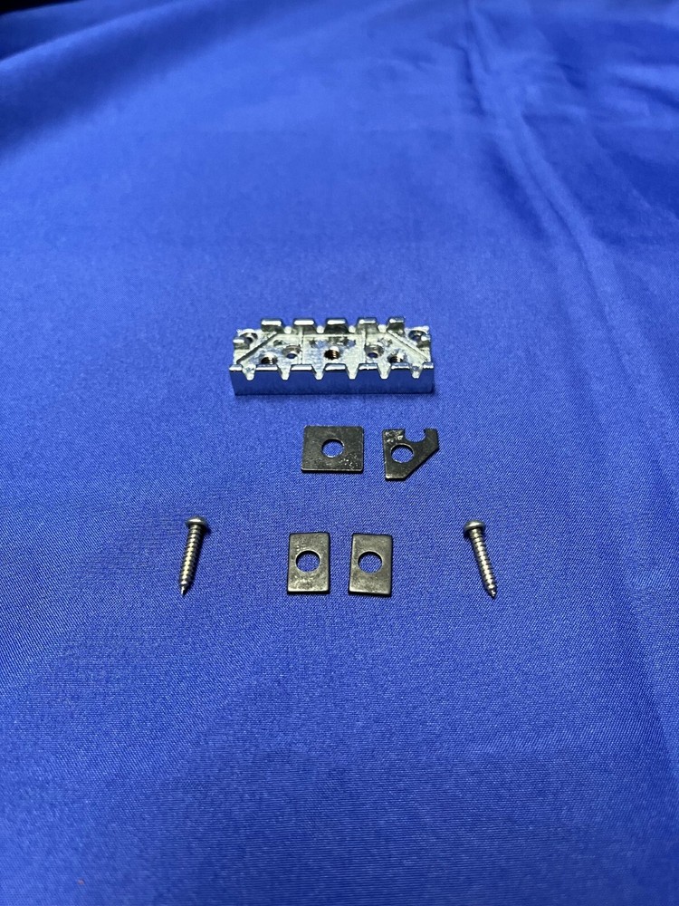 Locking Nut Wide Silver Base for an Electric Guitar