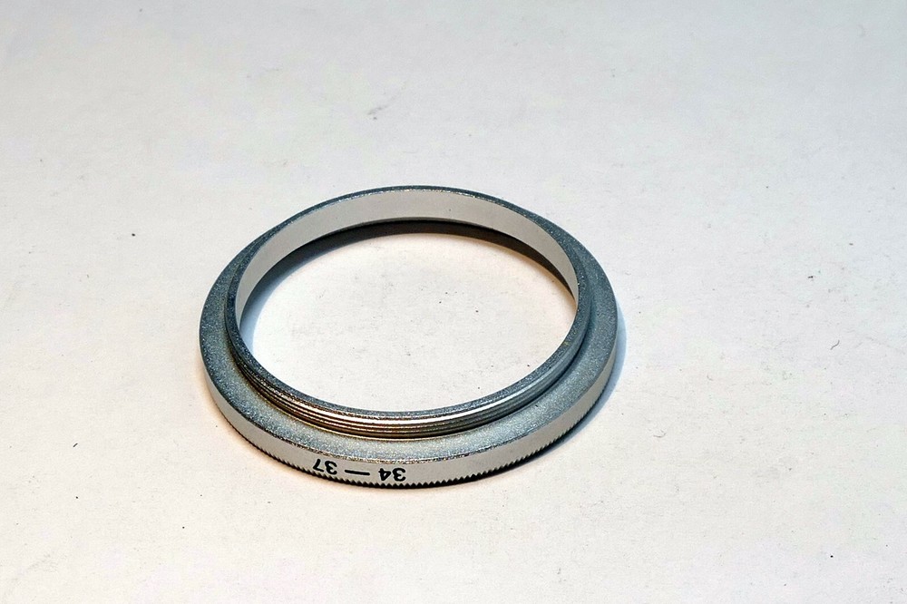 34mm to 37mm Step Up lens ring adapter screw in threaded (chrome)