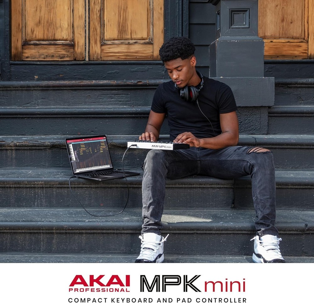 Compact MIDI Keyboard Controller with 8 Velocity Pads & Software Bundle Included