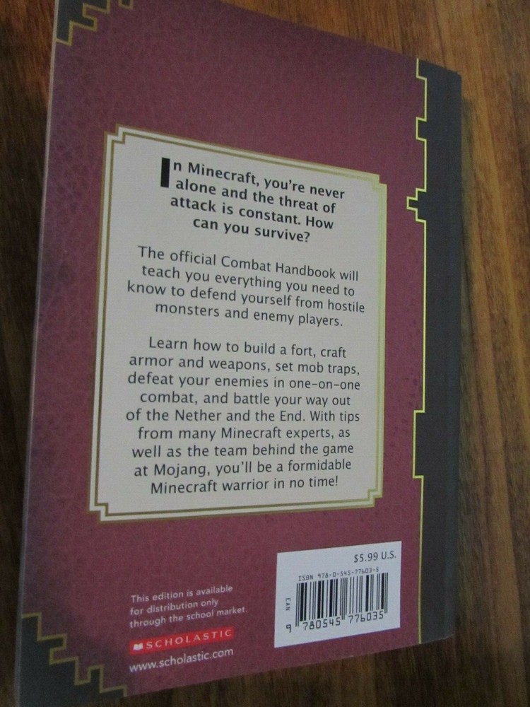 Copyright 2014 MINECRAFT Combat Handbook by MOJANG paperback book