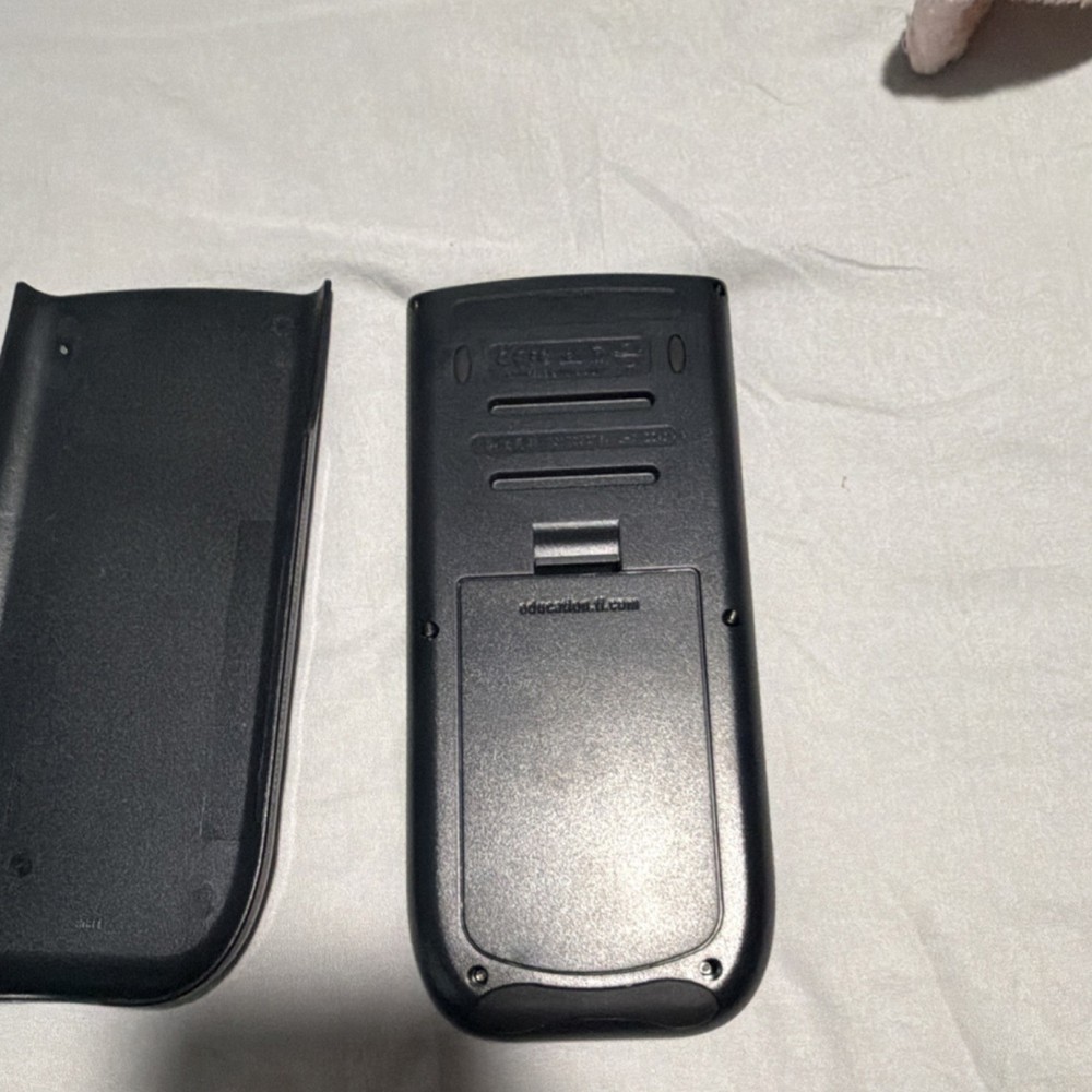 Texas Instruments TI-84 Plus Graphing Calculator Handheld LCD Display Battery