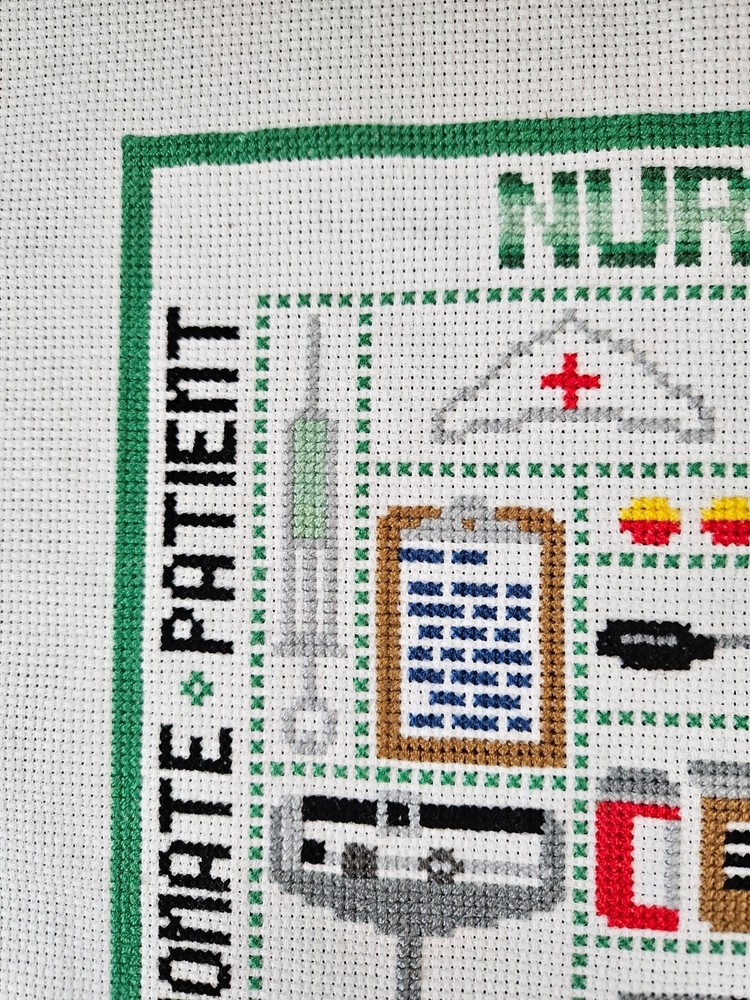 cross stitch completed finished hand made- Nurse sampler-unframed