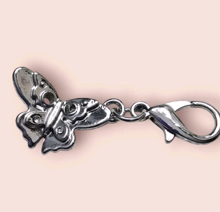 Coach mini butterfly charm