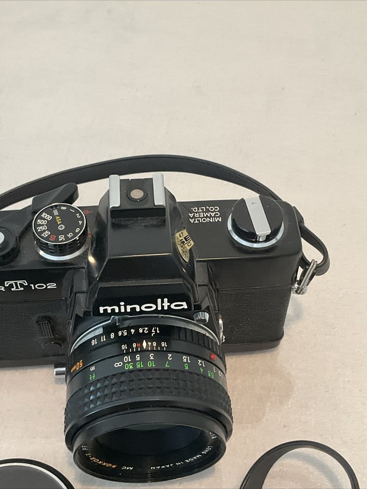 Minolta SRT 102/Black with 50/1.7 — LOOK