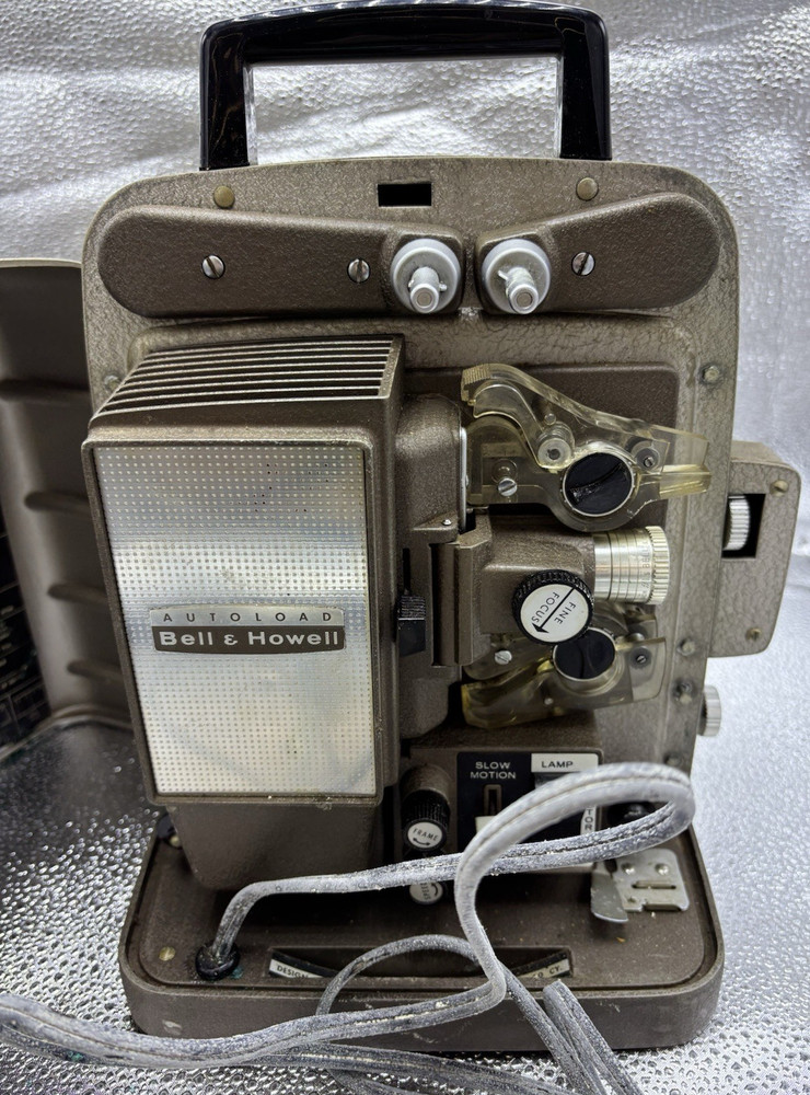 autoload bell and howell vintage self loading projector Untested