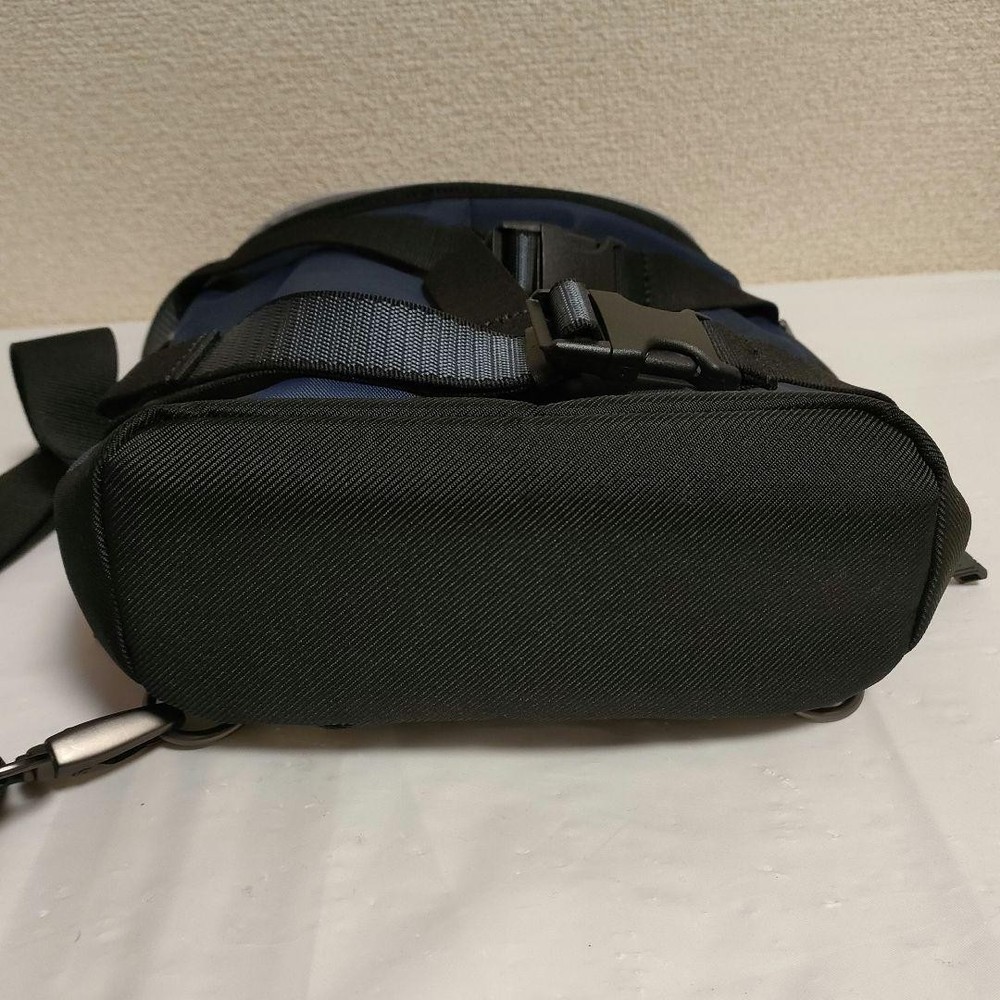 TUMI body bag slingback